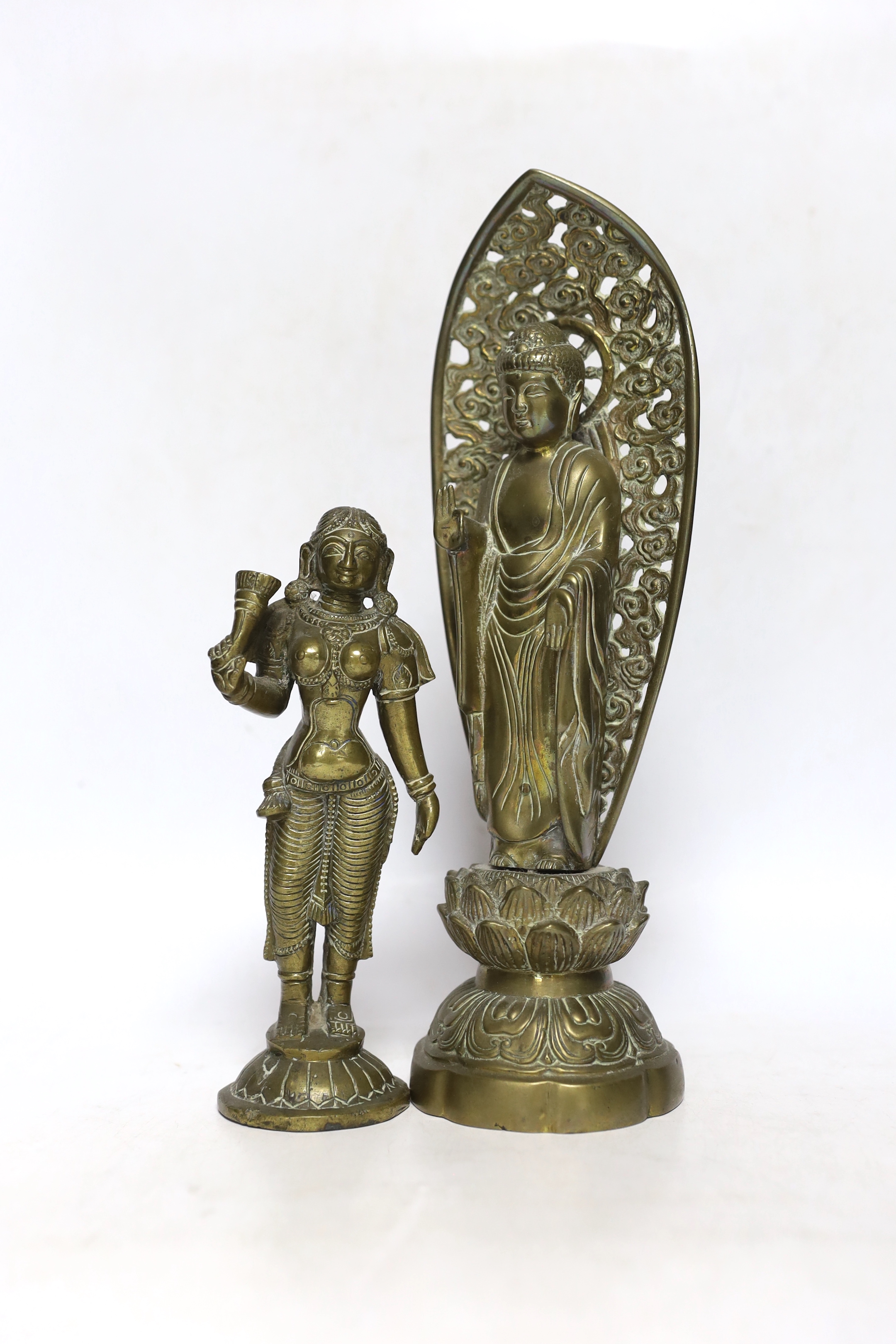 Four bronze deities and a Chinese copper pedestal bowl, tallest 29cm